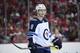 Winnipeg Jets defenseman Jacob Trouba (8) stands on the ice during the first period of an NHL hockey game against the Washington Capitals, Sunday, March 10, 2019, in Washington. (AP Photo/Nick Wass)