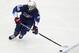 Jack Hughes of the US controls the puck during the Ice Hockey World Championships group A match between the United States and Finland at the Steel Arena in Kosice, Slovakia, Monday, May 13, 2019. (AP Photo/Petr David Josek)