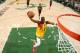 MILWAUKEE, WI - MARCH 24: Tony Snell #21 of the Milwaukee Bucks dunks the ball against the Cleveland Cavaliers on March 24, 2019 at the Fiserv Forum Center in Milwaukee, Wisconsin. NOTE TO USER: User expressly acknowledges and agrees that, by downloading and or using this Photograph, user is consenting to the terms and conditions of the Getty Images License Agreement. Mandatory Copyright Notice: Copyright 2019 NBAE (Photo by Gary Dineen/NBAE via Getty Images).