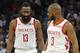 Houston Rockets' James Harden, left, and Chris Paul confer in an NBA basketball game against the Minnesota Timberwolves Wednesday, Feb. 13, 2019, in Minneapolis. (AP Photo/Jim Mone)