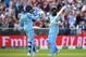 MANCHESTER, ENGLAND - JUNE 18: Eoin Morgan of England celebrates his century with Joe Root of England during the Group Stage match of the ICC Cricket World Cup 2019 between England and Afghanistan at Old Trafford on June 18, 2019 in Manchester, England. (Photo by Clive Mason/Getty Images)