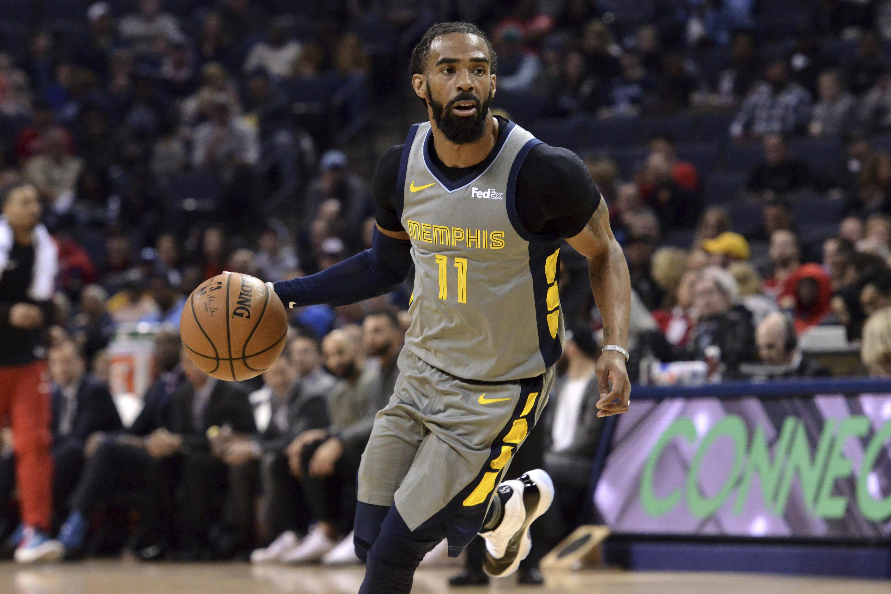 Mike Conley traded to Utah Jazz after 12 seasons in Memphis - Land-Grant  Holy Land