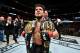 CHICAGO, IL - JUNE 08: Henry Cejudo celebrates his TKO victory over Marlon Moraes of Brazil in their bantamweight championship bout during the UFC 238 event at the United Center on June 8, 2019 in Chicago, Illinois. (Photo by Jeff Bottari/Zuffa LLC/Zuffa LLC via Getty Images)