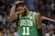 Boston Celtics' Kyrie Irving during the first half of an NBA basketball game against the Milwaukee Bucks Thursday, Feb. 21, 2019, in Milwaukee. (AP Photo/Aaron Gash)