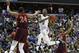 FILE - In this March 29, 2019, file photo, Duke forward RJ Barrett (5) drives to the basket past Virginia Tech forward Kerry Blackshear Jr. (24) and guard Ahmed Hill (13) during the second half of an NCAA men's East Regional semifinal college basketball game, in Washington. Barrett is leaving Duke after one season to enter the NBA draft. Barrett announced his decision Wednesday, April 10, 2019, in a video posted on social media. He calls playing at Duke a dream and adds that “it’s also a dream of mine to play in the NBA and have great success there.”(AP Photo/Alex Brandon, File)