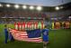 Players of USA (L) and Guyana (R) stand for the National anthem ahead of the 2019 CONCACAF Gold Cup Group D match between USA and Guyana on June 18, 2019 at Allianz Field in Saint Paul, Minnesota. (Photo by Kerem Yucel / AFP) (Photo credit should read KEREM YUCEL/AFP/Getty Images)