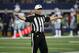 Referee Walt Anderson (66) signals from the field during an NFC wild-card NFL football game between the Seattle Seahawks ad Dallas Cowboys in Arlington, Texas, Saturday, Jan. 5, 2019.(AP Photo/Roger Steinman)