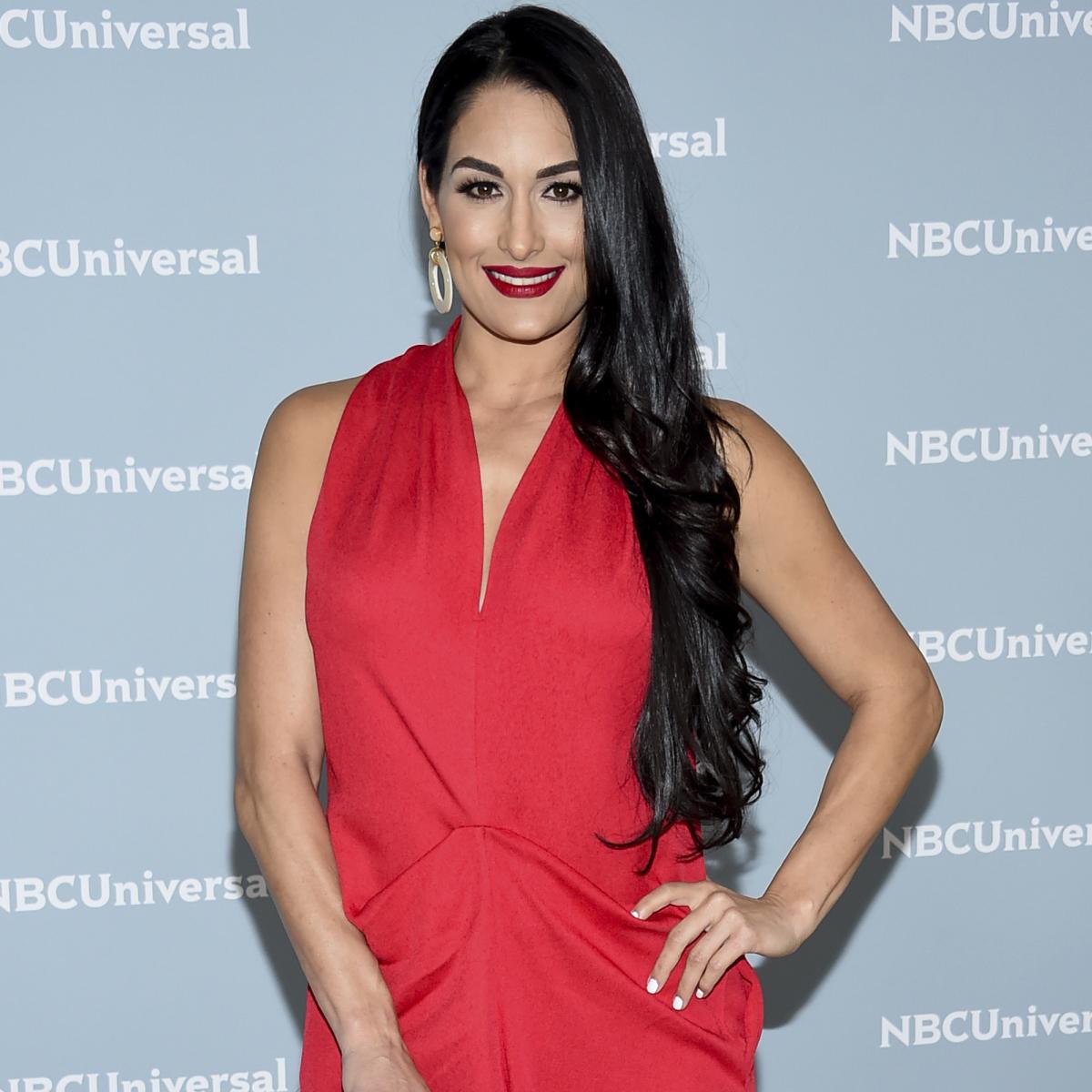 Nikki Bella proves she's still in great shape as she parades toned abs  months after quitting WWE