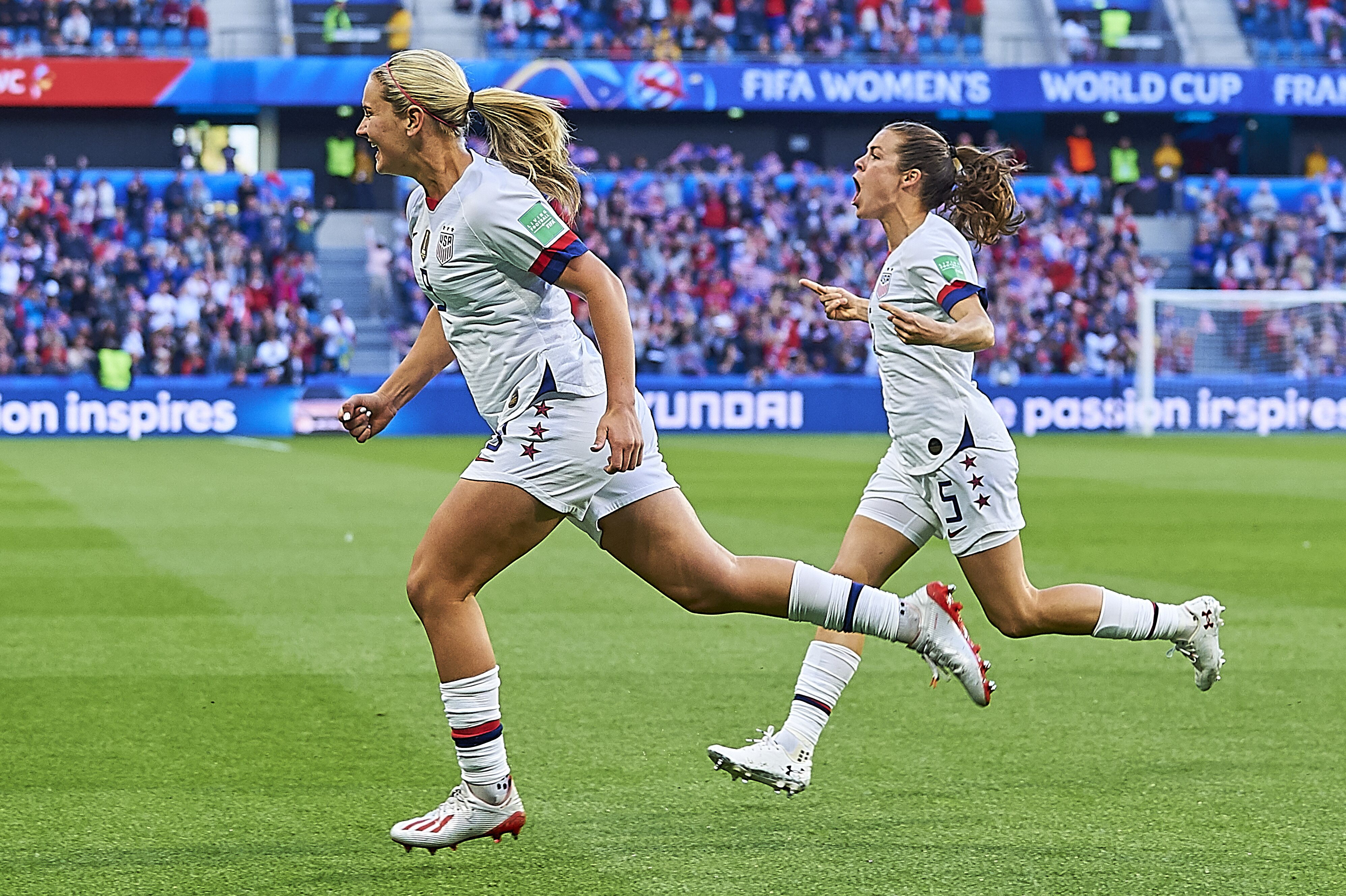 LE HAVRE, FRANCE - JUNE 20: Lindsey Horan of USA celebrates scoring her team's opening goal with team mates during the 2019 FIFA Women's World Cup France group F match between Sweden and USA at  on June 20, 2019 in Le Havre, France. (Photo by Quality Sport Images/Getty Images)