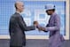 Murray State's Ja Morant, right, is greeted by NBA Commissioner Adam Silver after being selected by the Memphis Grizzlies with the second pick in the NBA basketball draft Thursday, June 20, 2019, in New York. (AP Photo/Julio Cortez)