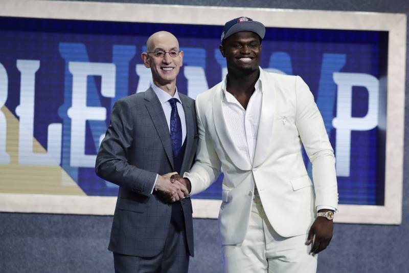 Zion Williamson joins commissioner on the stage after he was the No. 1 pick in the NBA Draft.
