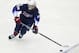 Jack Hughes has an uncanny ability to hold on to the puck and create scoring opportunities for himself and his teammates.