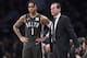 Brooklyn Nets head coach Kenny Atkinson talks to guard D'Angelo Russell (1) during the second half of Game 4 of a first-round NBA basketball playoff series, Saturday, April 20, 2019, in New York. The 76ers won 112-108. (AP Photo/Mary Altaffer)