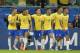 (L-R) Brazil's Arthur, Everton, Philippe Coutinho, Dani Alves, Roberto Firmino and Gabriel Jesus react as they were celebrating a goal by Philippe Coutinho against Venezuela after Chilean referee Julio Bascunan (out of frame) talks to referees of the VAR, moments before disallowing a goal for the second time during their Copa America football tournament group match at the Fonte Nova Arena in Salvador, Brazil, on June 18, 2019. (Photo by Raul ARBOLEDA / AFP) (Photo credit should read RAUL ARBOLEDA/AFP/Getty Images)