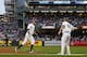 NEW YORK, NY - JUNE 17: DJ LeMahieu #26 of the New York Yankees celebrates with Phil Nevin #88 of the New York Yankees after hitting a two run home run against the Tampa Bay Rays during the third inning at Yankee Stadium on June 17, 2019 in the Bronx borough of New York City. (Photo by Adam Hunger/Getty Images)