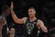 Milwaukee Bucks center Brook Lopez (11) reacts during the first quarter of an NBA basketball game against the New York Knicks, Saturday, Dec. 1, 2018, in New York.(AP Photo/Julie Jacobson)