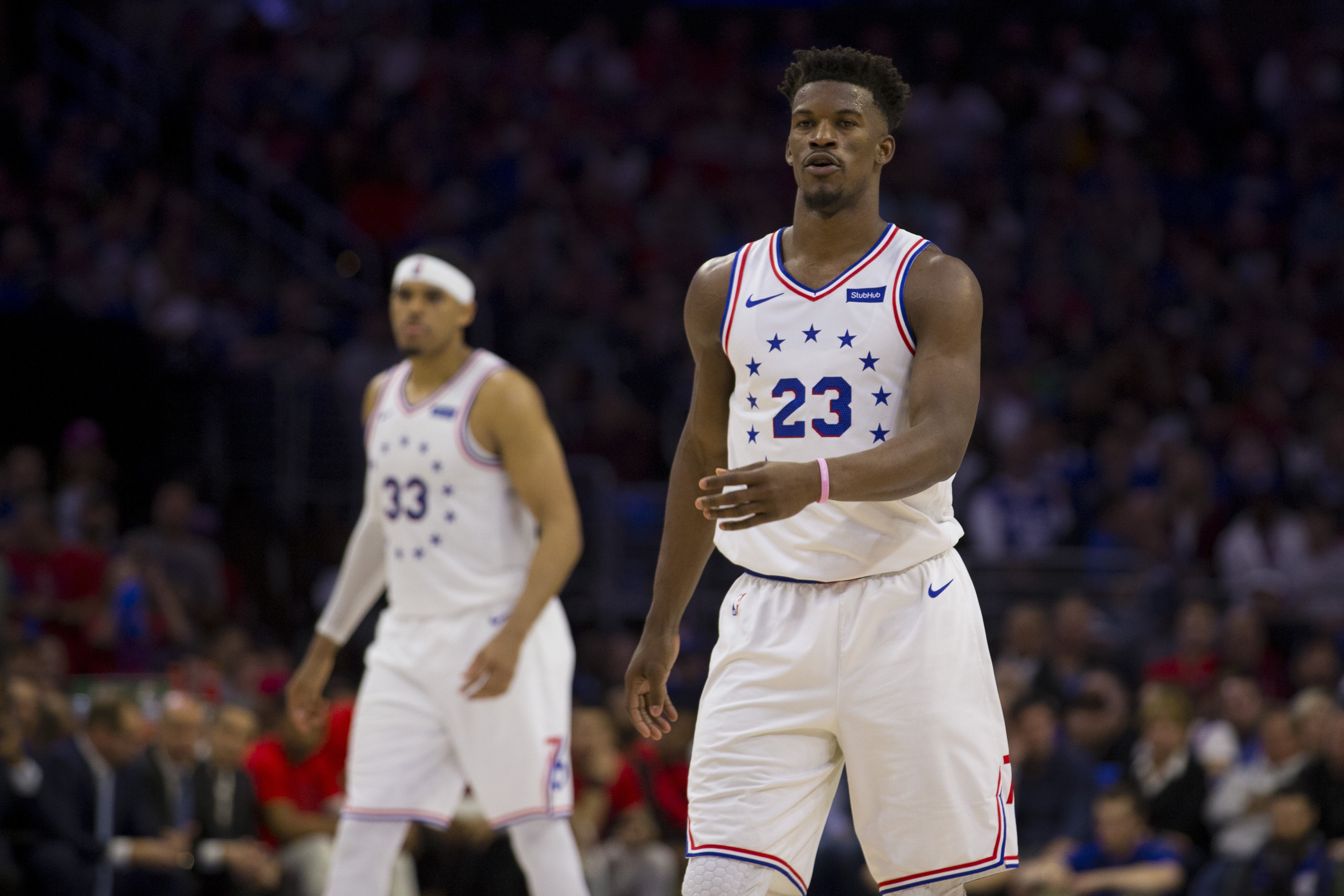 PHILADELPHIA, PA - MAY 05: Jimmy Butler #23 and Tobias Harris #33 of the Philadelphia 76ers look on against the Toronto Raptors in Game Four of the Eastern Conference Semifinals at the Wells Fargo Center on May 5, 2019 in Philadelphia, Pennsylvania. The Raptors defeated the 76ers 101-96. NOTE TO USER: User expressly acknowledges and agrees that, by downloading and or using this photograph, User is consenting to the terms and conditions of the Getty Images License Agreement. (Photo by Mitchell Leff/Getty Images)
