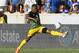 HOUSTON, TEXAS - JUNE 21: Leon Bailey #7 of Jamaica stretches out to control the ball during the CONCACAF Gold Cup Group C game between El Salvador and Jamaica at BBVA Stadium on June 21, 2019 in Houston, Texas. (Photo by Bob Levey/Getty Images)