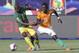 Ivory Coast's Serge Wilfried Kanon, left, and South Africa's Dean Furman fight for the ball during the African Cup of Nations group D soccer match between Ivory Coast and South Africa in Al Salam Stadium in Cairo, Egypt, Monday, June 24, 2019. (AP Photo/Hassan Ammar)