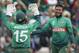 Bangladesh's Shakib Al Hasan (R) celebrates with teammate Mushfiqur Rahim after the dismissal of Afghanistan's Najibullah Zadran during the 2019 Cricket World Cup group stage match between Bangladesh and Afghanistan at the Rose Bowl in Southampton, southern England, on June 24, 2019. (Photo by Adrian DENNIS / AFP) / RESTRICTED TO EDITORIAL USE (Photo credit should read ADRIAN DENNIS/AFP/Getty Images)