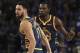 Golden State Warriors' Klay Thompson, left, and Kevin Durant celebrate a score against the Sacramento Kings during the second half of an NBA basketball game Saturday, Nov. 24, 2018, in Oakland, Calif. (AP Photo/Ben Margot)