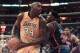 LOS ANGELES, UNITED STATES: Shaquille O'Neal of the Los Angeles Lakers (L) eyes the basket as he moves past Patrick Ewing of the New York Knicks during their 02 April 2000 game in Los Angeles, Ca. (ELECTRONIC IMAGE) AFP PHOTO/Vince BUCCI (Photo credit should read Vince Bucci/AFP/Getty Images)