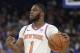 New York Knicks' Emmanuel Mudiay (1) moves the ball against the Orlando Magic during the first half of an NBA basketball game, Wednesday, April 3, 2019, in Orlando, Fla. (AP Photo/John Raoux)
