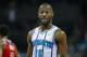 Charlotte Hornets guard Kemba Walker stands on the court during a break in the action against the Washington Wizards in the first half of an NBA basketball game in Charlotte, N.C., Friday, March 8, 2019. Charlotte won 112-111. (AP Photo/Nell Redmond)