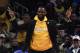 Los Angeles Lakers forward LeBron James celebrates from the bench during the second half of an NBA basketball game against the Los Angeles Clippers Friday, April 5, 2019, in Los Angeles. The Lakers won 122-117. (AP Photo/Mark J. Terrill)
