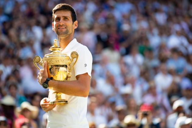 LONDON - ENGLAND JULY 15: Novak Djokovic from Serbia with winners trophy after defeating Kevin Anderson from South Africa (not pictured) in the Men's Singles Final. The Wimbledon Lawn Tennis Championship at the All England Lawn Tennis and Croquet Club at Wimbledon on July 15th, 2018 in London, England. (Photo by Simon Bruty/Any Chance/Getty Images)