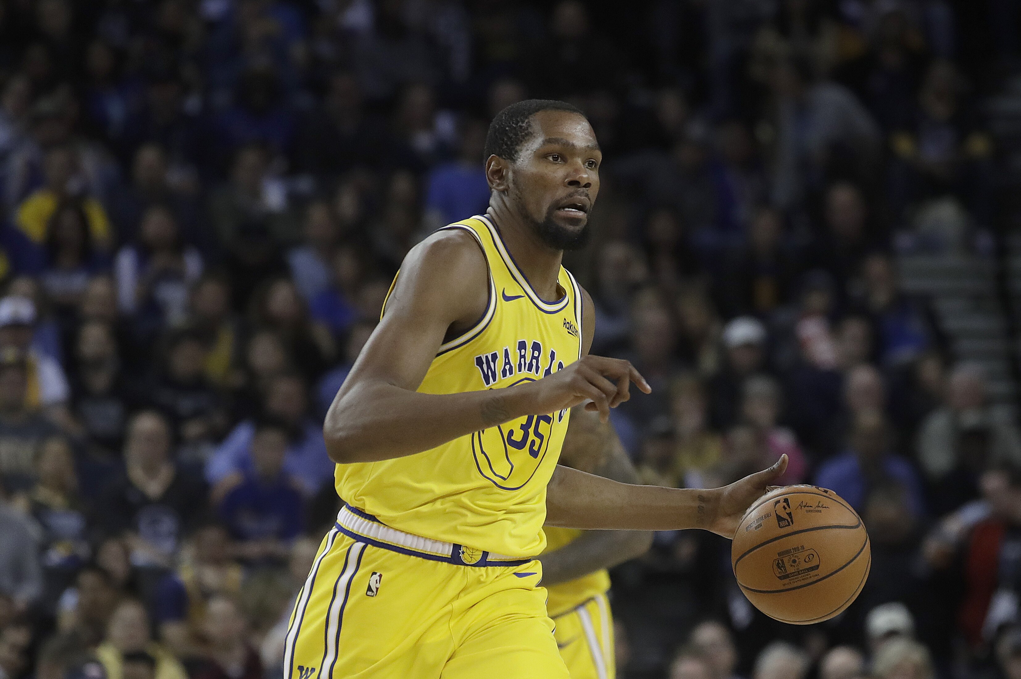 Golden State Warriors forward Kevin Durant (35) against the Denver Nuggets during an NBA basketball game in Oakland, Calif., Tuesday, April 2, 2019. (AP Photo/Jeff Chiu)