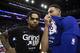 Philadelphia 76ers' Ben Simmons, right, of Australia, talks with Brooklyn Nets' D'Angelo Russell, left, following the second half in Game 5 of a first-round NBA basketball playoff series, Tuesday, April 23, 2019, in Philadelphia. The 76ers won 122-100. (AP Photo/Chris Szagola)