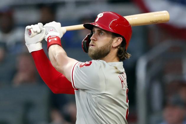 Philadelphia Phillies' Bryce Harper follows through on a home run in the sixth inning of a baseball game against the Atlanta Braves Wednesday, July 3, 2019, in Atlanta. (AP Photo/John Bazemore)