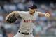 Boston Red Sox starting pitcher Chris Sale throws a pitch to New York Yankees' DJ LeMahieu during the first inning of a baseball game, Friday, May 31, 2019, in New York. (AP Photo/Julio Cortez)
