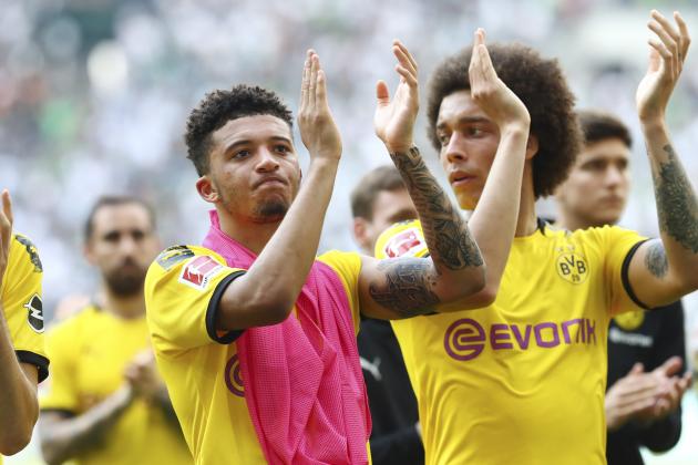 MOENCHENGLADBACH, GERMANY - MAY 18: Jadon Malik Sancho of Borussia Dortmund and Axel Witsel of Borussia Dortmund gesture after the Bundesliga match between Borussia Moenchengladbach and Borussia Dortmund at Borussia-Park on May 18, 2019 in Moenchengladbach, Germany. (Photo by TF-Images/Getty Images)
