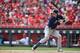 CINCINNATI, OH - JULY 4: Christian Yelich #22 of the Milwaukee Brewers bats against the Cincinnati Reds at Great American Ball Park on July 4, 2019 in Cincinnati, Ohio. (Photo by Jamie Sabau/Getty Images)