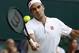 Switzerland's Roger Federer returns the ball to Italy's Matteo Berrettini in a men's singles match during day seven of the Wimbledon Tennis Championships in London, Monday, July 8, 2019. (AP Photo/Alastair Grant)