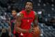 Injured Washington Wizards center Dwight Howard practices before the Wizards face the Denver Nuggets in the first half of an NBA basketball game Sunday, March 31, 2019, in Denver. (AP Photo/David Zalubowski)