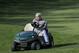 John Daly gets in his golf cart after putting on the fifth green during the second round of the PGA Championship golf tournament, Friday, May 17, 2019, at Bethpage Black in Farmingdale, N.Y. (AP Photo/Julio Cortez)