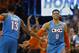 Oklahoma City Thunder guard Russell Westbrook (0) celebrates with Paul George (13) after a basket during the second half of Game 3 of the team's NBA basketball first-round playoff series against the Portland Trail Blazers on Friday, April 19, 2019, in Oklahoma City. (AP Photo/Sue Ogrocki)