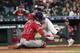 Houston Astros' Jake Marisnick, right, collides Los Angeles Angels catcher Jonathan Lucroy (20) while trying to score during the eighth inning of a baseball game Sunday, July 7, 2019, in Houston. Marisnick was called out under the home plate collision rule. (AP Photo/David J. Phillip)
