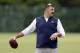 Tennessee Titans head coach Mike Vrabel watches players during an organized team activity at the Titans' NFL football training facility Thursday, May 30, 2019, in Nashville, Tenn. (AP Photo/Mark Humphrey)