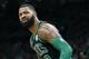 Boston Celtics' Marcus Morris reacts after making a shot during the first half of an NBA basketball game against the Charlotte Hornets in Boston, Sunday, Dec. 23, 2018. (AP Photo/Michael Dwyer)