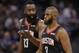 Houston Rockets guard James Harden, left, talks with teammate Chris Paul as they walk off the court during a timeout in the second half of an NBA basketball game against the Sacramento Kings, Tuesday, April 2, 2019, in Sacramento, Calif. The Rockets won 130-105. (AP Photo/Rich Pedroncelli)