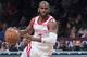 Houston Rockets guard Chris Paul handles the ball during the first half of an NBA basketball game against the Brooklyn Nets, Friday, Nov. 2, 2018, in New York. (AP Photo/Mary Altaffer)