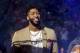 New Orleans Pelicans forward Anthony Davis (23) wears a T-shirt with 'That's All, Folks,' printed on it during player introduction before an NBA basketball game between the New Orleans Pelicans and the Golden State Warriors in New Orleans, Tuesday, April 9, 2019. (AP Photo/Scott Threlkeld)