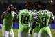 Nigeria's forward Alex Iwobi (C) celebrates his goal with teammates during the 2019 Africa Cup of Nations (CAN) Round of 16 football match between Nigeria and Cameroon at the Alexandria Stadium in the Egyptian city on July 6, 2019. (Photo by JAVIER SORIANO / AFP) (Photo credit should read JAVIER SORIANO/AFP/Getty Images)
