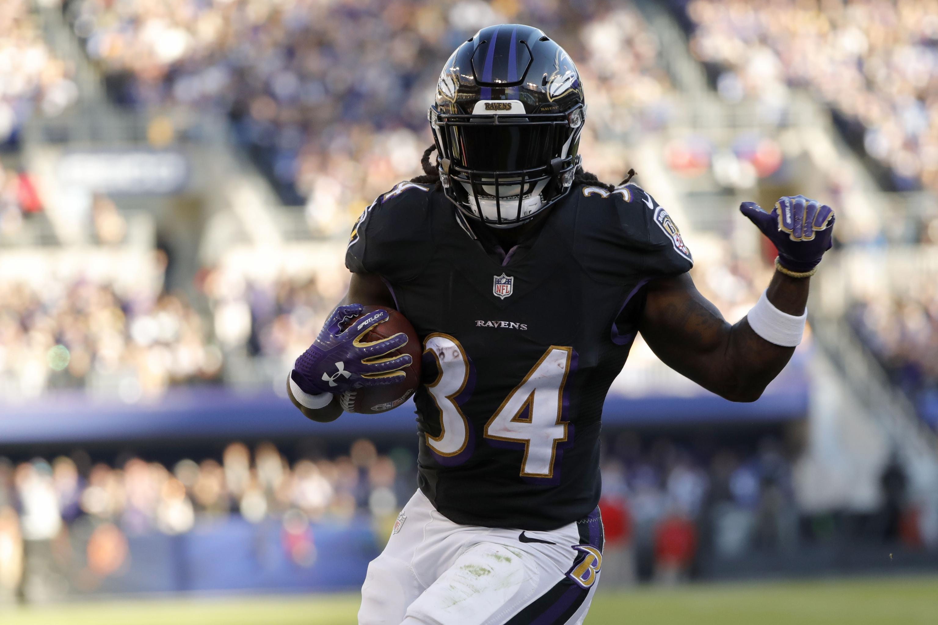 Baltimore Ravens running back Alex Collins (34) plays in an NFL football  game against the Pittsburgh Steelers, Sunday, Dec. 10, 2017, in Pittsburgh.  (AP Photo/Don Wright Stock Photo - Alamy