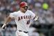 American League's Mike Trout, of the Los Angeles Angels, grounds out during the first inning of the MLB baseball All-Star Game against the National League, Tuesday, July 9, 2019, in Cleveland. Trout is wearing the number of Los Angeles Angels pitcher Tyler Skaggs who recently passed away. (AP Photo/Tony Dejak)