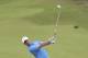 Northern Ireland's Rory McIlroy plays a shot on the 8th fairway during a practice round ahead of the start of the British Open golf championships at Royal Portrush in Northern Ireland, Tuesday, July 16, 2019. The British Open starts Thursday. (AP Photo/Peter Morrison)